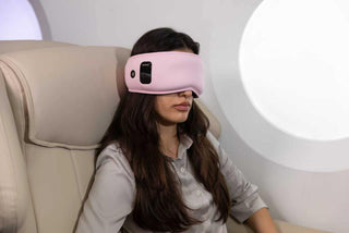 Woman wearing Hypnuse blackout sleep mask sleeping in complete darkness