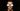 Person using a smart sleep wearable and AI sleep mask to monitor sleep quality and improve nighttime rest